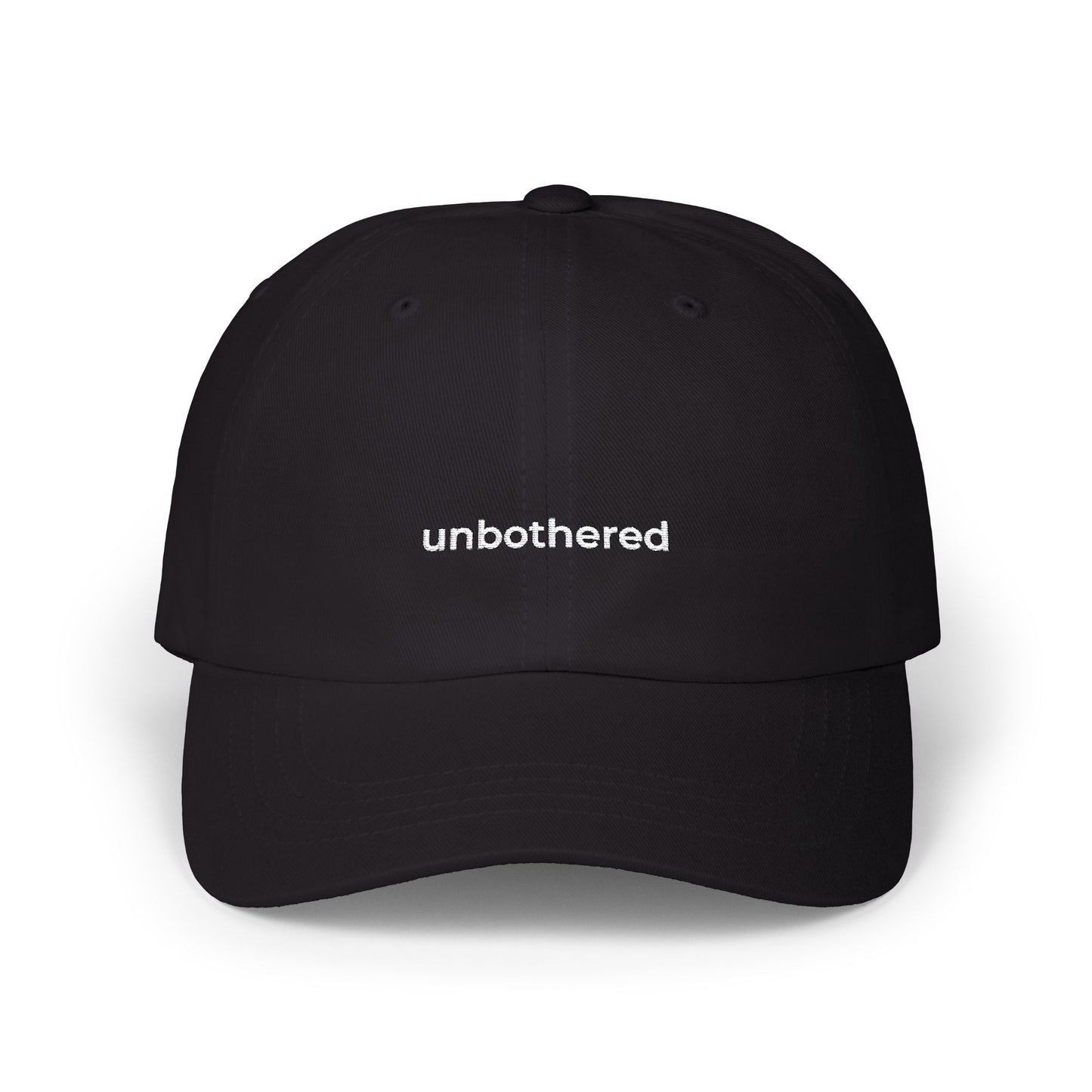 Embroidered cap “unbothered.”