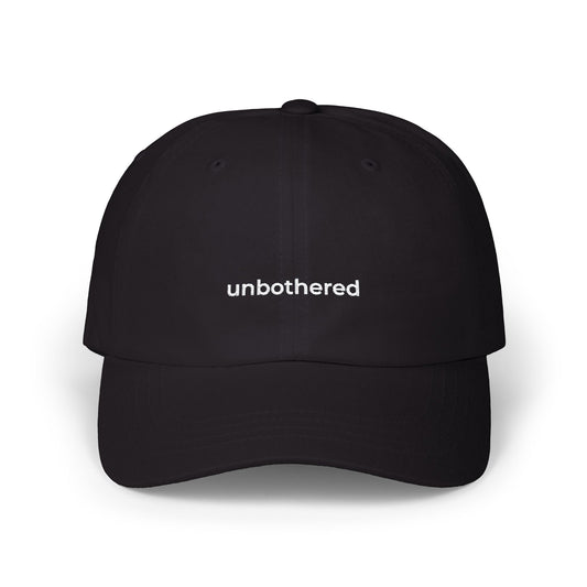 Embroidered cap “unbothered.”