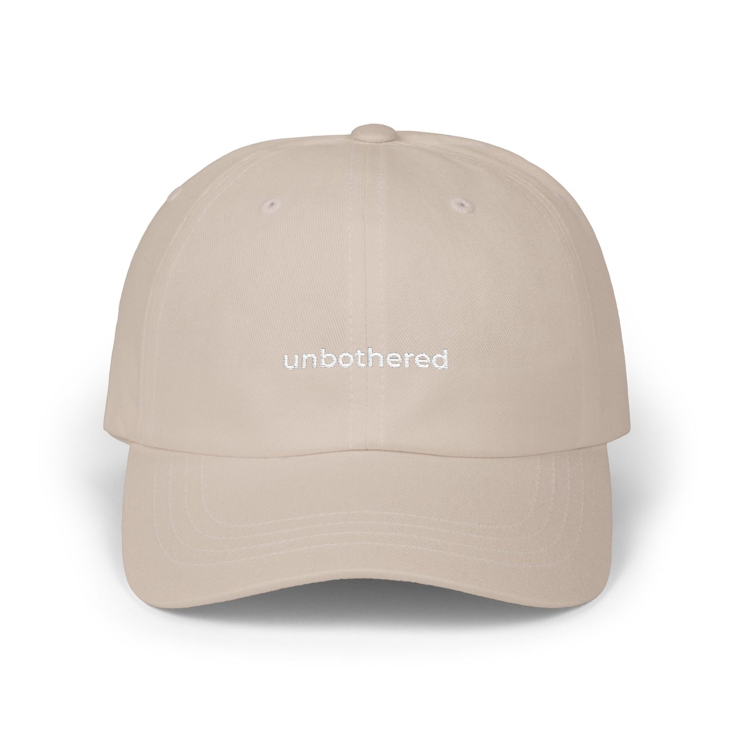 Embroidered cap “unbothered.”