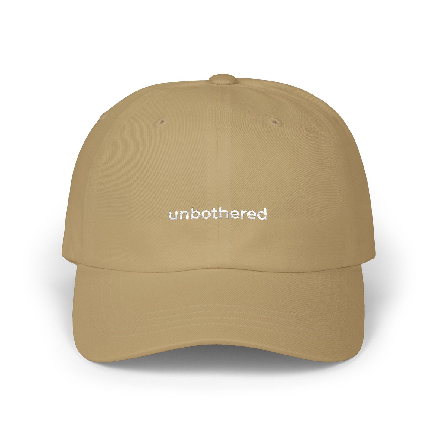 Embroidered cap “unbothered.”