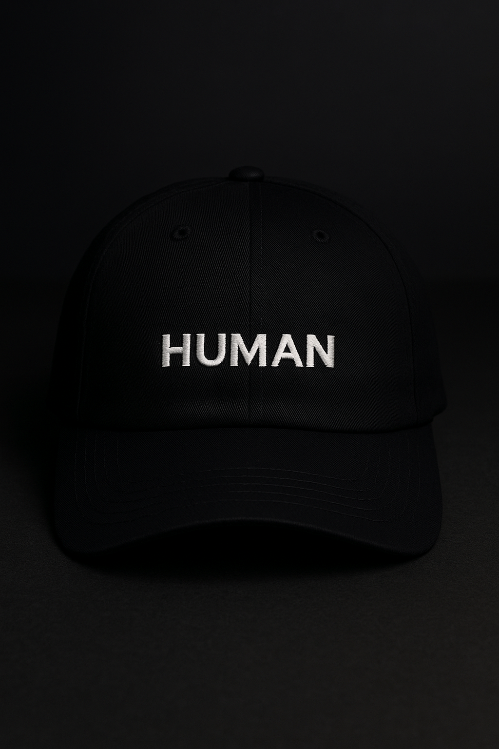 Embroidered “HUMAN” Cap.