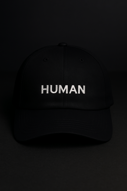 Embroidered “HUMAN” Cap.