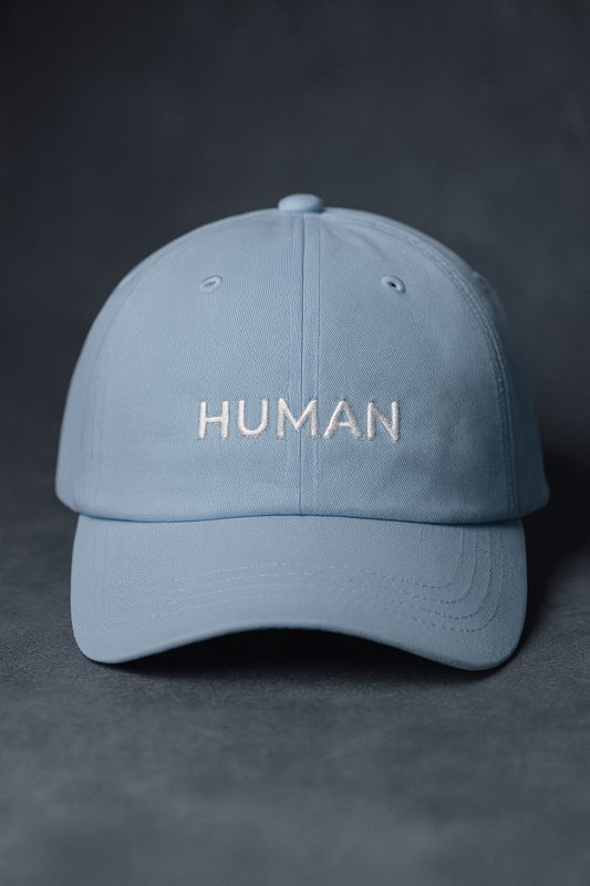 Embroidered “HUMAN” Cap.